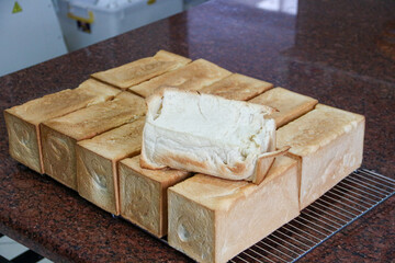 freshly baked broken white bread