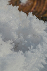 Close - up shots of the snow surface and snowflakes