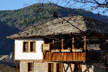 A pretty house with a balcony in Kovachevitsa in Bulgaria in November
