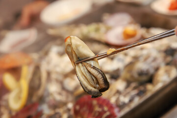 Korean seafood food. Steamed oysters and scallops