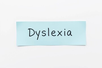 Text Dyslexia on blue note on white background