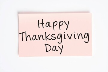 Text Happy Thanksgiving Day on pink note on white background
