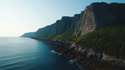 Coastal Cliffs and Azure Sea A breathtaking view of rugged cliffs meeting the sea