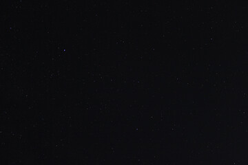 Many constellations and stars in the clear night sky shine at night