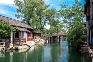 Fototapeta premium Stone Bridges and peasant houses in rural rivers in southern China