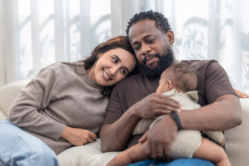 Fototapeta premium Happy Black Family Relaxing at Home
