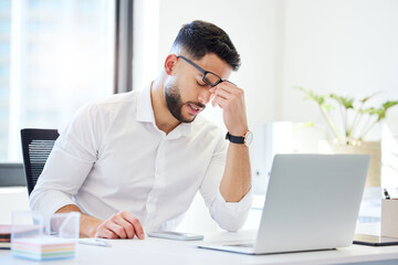 Businessman, headache or laptop with stress for strain, pressure or bankruptcy at office desk. Man, employee or accountant with migraine on computer for debt, vertigo or financial crisis at workplace