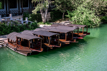 Small Chinese fishing boat on the river