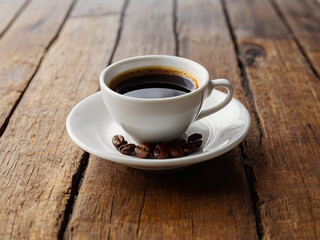 a cup of black coffee on the table