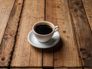 Fototapeta premium a cup of black coffee on the table