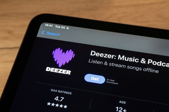 App store with Deezer music streaming mobile application on smartphone
