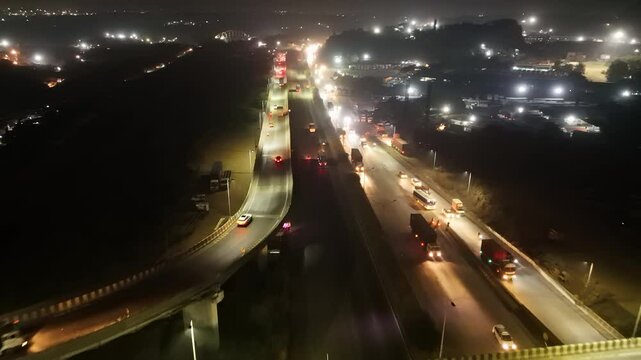 Aerial Nighttime View of Busy Highway with Traffic