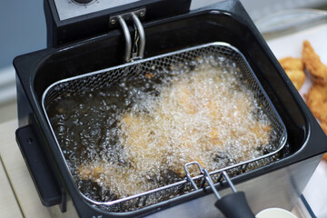deep frying, deep frying chicken nuggets, in vegetable oil, hot oil boiling, close, tasty, food, smell of chicken, fried fast food, cooking, tasty, kitchen tool, fat, unhealthy