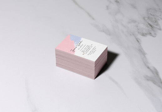 Unique Plain Pink Business Cards Stacked on a Marble Surface
