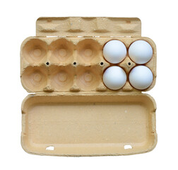 Chicken eggs in egg box isolated on white background