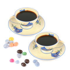 Coffee in vintage porcelain cup and dragee candies isolated on white background. Free space for text.