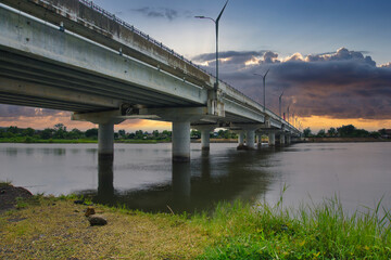 Kretek 2 Bridge Road on the Parangtritis South Java Cross-Island Route stretches across the horizon with decorative street lights.