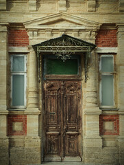 Old  door, stone ancient building. Vintage architecture.