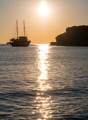 A sunset cruise ship tour on the island of Mykonos in Greece