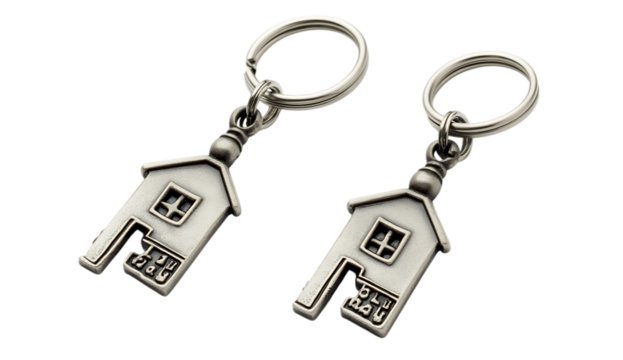Silver metal house keychains. Home, sweet home concept.