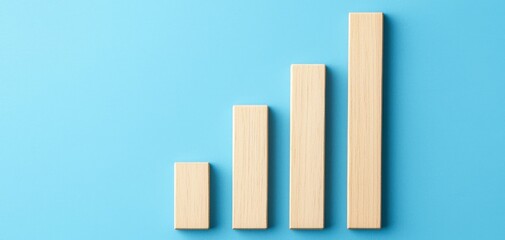 Leadership drives growth in management. Wooden bars representing growth against a blue background.