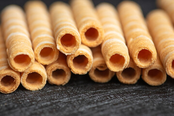 Delicate Rolled Wafer Stacks on Dark Surface