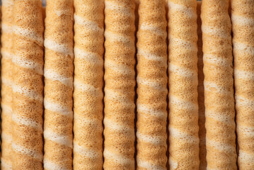 Close-Up of Sweet Wafer Rolls in a Tidy Row