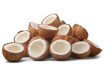 pile of coconuts cut in half isolated white background, brown fibrous husk and inner white flesh...