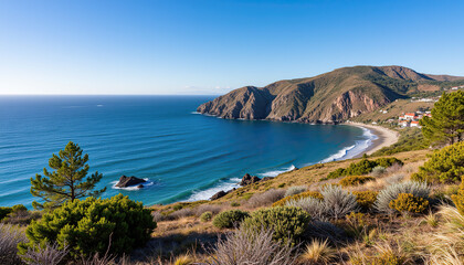 Scenic beach view with mountains and blue ocean