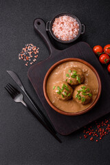 Meatballs with salt and spices in creamy caramel sauce