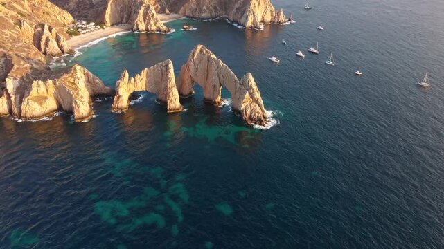 A breathtaking 4K ultra-HD aerial stock video capturing the iconic Land&rsquo;s End and the Arch of Cabo San Lucas, Baja California Sur, Mexico, at the dramatic meeting point of the Pacific Ocean and the Gu