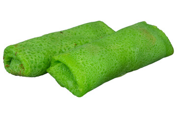 Indonesian dadar gulung pandan pancakes with sweet coconut filling isolated background