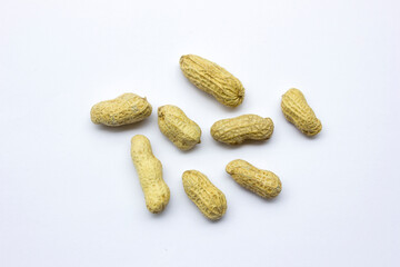 A pile of peanuts isolated on a white background.