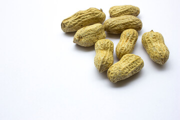 A pile of peanuts isolated on a white background.