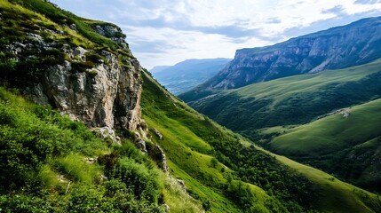 Naklejka premium Majestic Mountain Valley with Lush Green Hills under Expansive Cloudy Sky : Generative AI