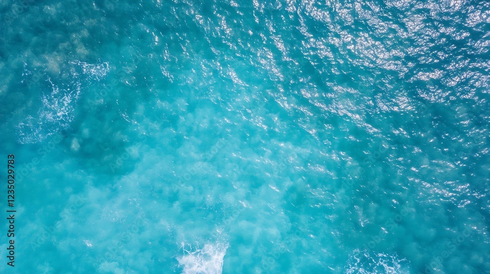 Poster aerial view of vibrant turquoise ocean waves with sunlight reflecting on the water surface : generat
