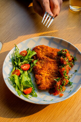 grilled fish on a plate in a restaurant