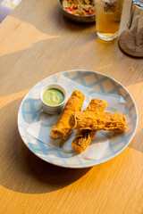 fried sweet potato vedges on a plate 