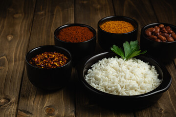 Traditional Turkish cuisine. Haricot Beans, rice and beans on wooden background