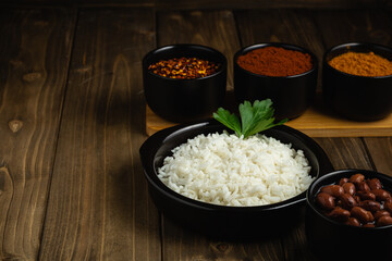 Traditional Turkish cuisine. Haricot Beans, rice and beans on wooden background