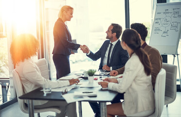 Handshake, success and contract with business people in meeting for deal merger, acquisition and...