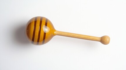 A jar of honey with a wooden dipper isolated on a white background Shown in top view with copy space for text or product promotion
