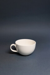 White cup on the table