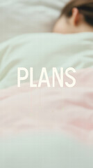 Contemplative Dreams: A peaceful scene, the word "PLANS" overlays a serene image of a person resting in bed, surrounded by soft bedding, evoking themes of introspection, rest, and future aspirations.
