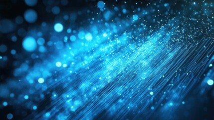 Blue light streaks and bokeh particles on a dark background, suitable for tech design
