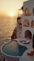 Sunset luxury villa with infinity pool overlooking the sea.