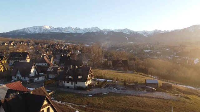 small village in front of mountains