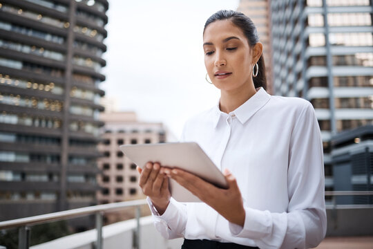 Serious, online and woman with tablet, balcony and planning for financial report, accountant and outdoor. Business, reading and auditor with app for records, information and data collection for tax