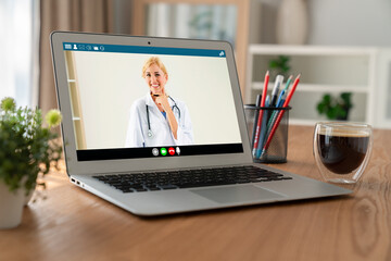 Fototapeta premium Doctor video call online by modish telemedicine software application for virtual meeting with patient