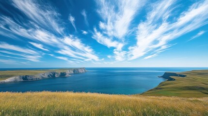 Coastal cliffscape, dramatic sky, ocean view, summer